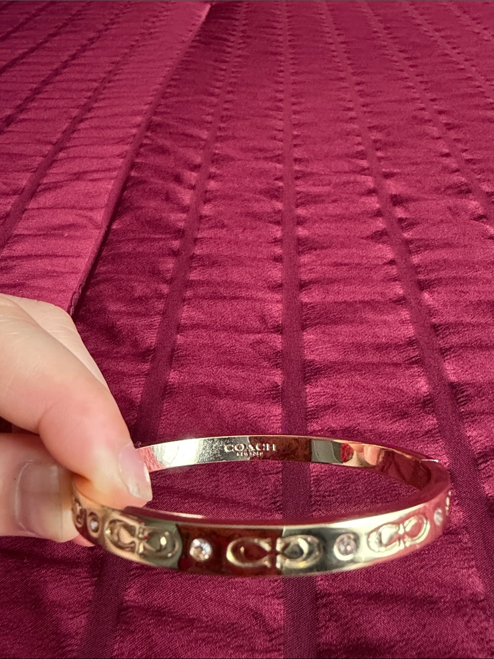 Coach Rose Gold-tone Signature Cutout Bangle Bracelet